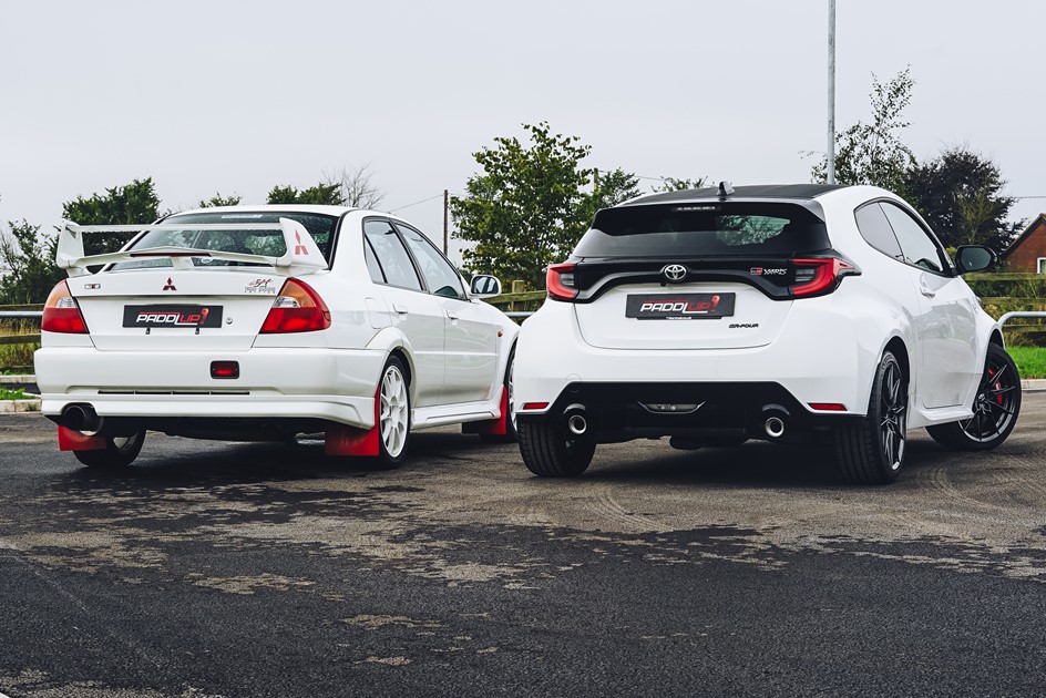The rears of a Toyota GR Yaris and Mitsubishi Lancer EVO Tommi Makinen 
