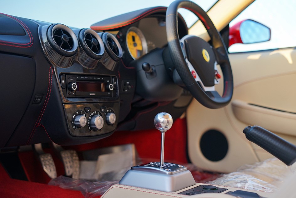 The interior of a manual Ferrari F430