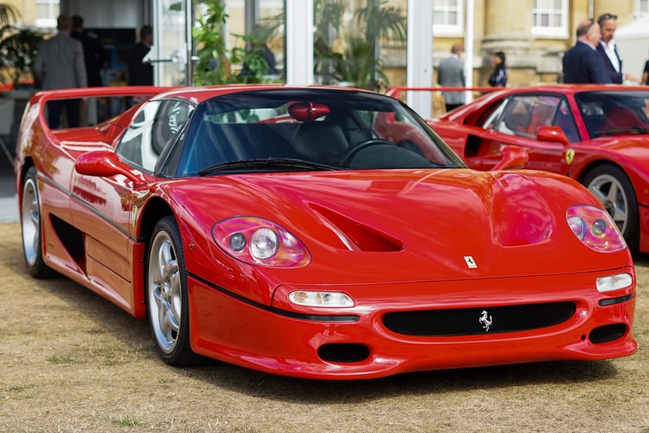 A Ferrari F50 as part of a big five display at Salon Privé