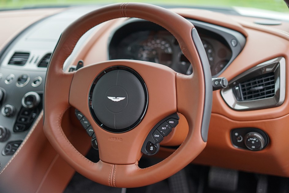 The iconic Aston Martin One-77 style steering wheel