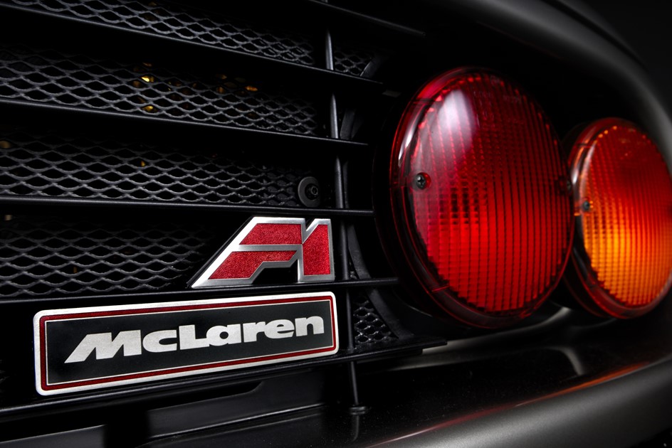McLaren F1 badge - a supercar that shares parts with everyday cars