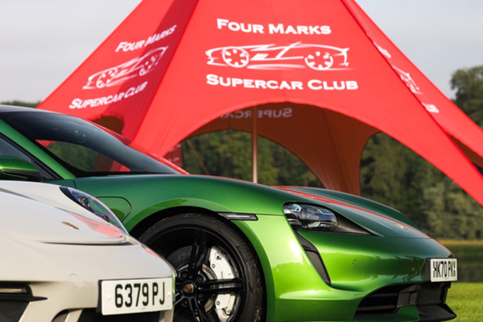 Porsches in front of supercar owners club Four Marks branding